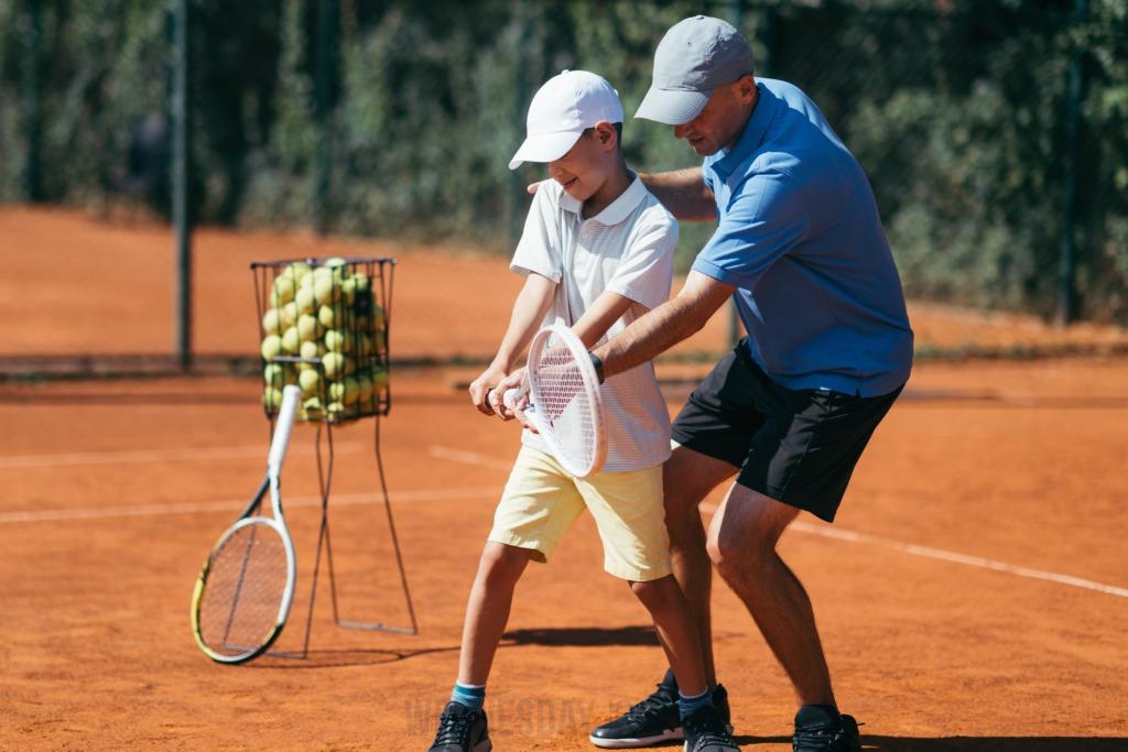 boy-learning-to-play-tennis-2021-08-26-16-54-04-utc.jpg
